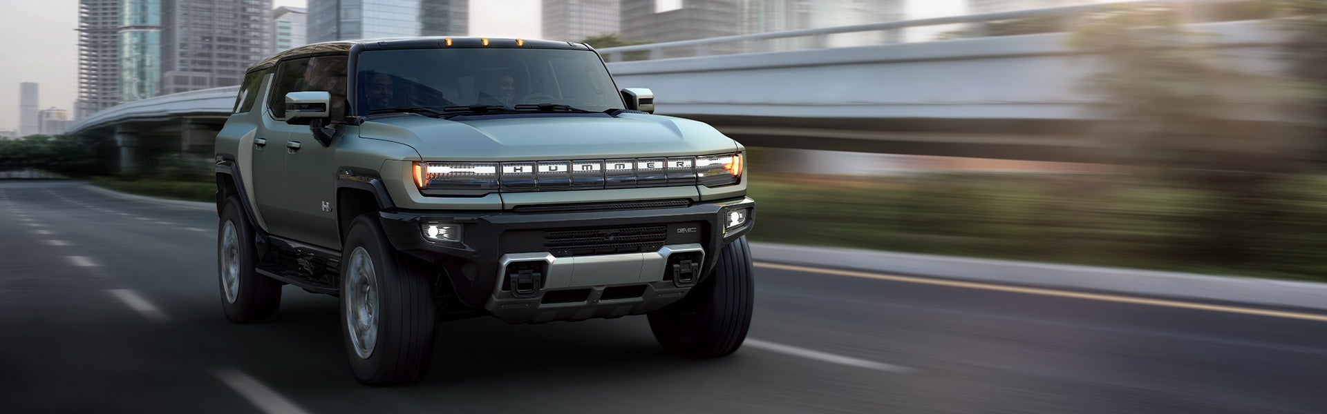 2024 GMC Hummer EV driving on the highway